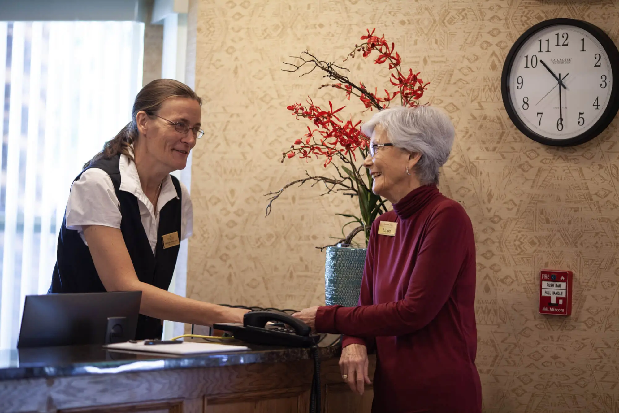 RLC concierge helping RLC resident