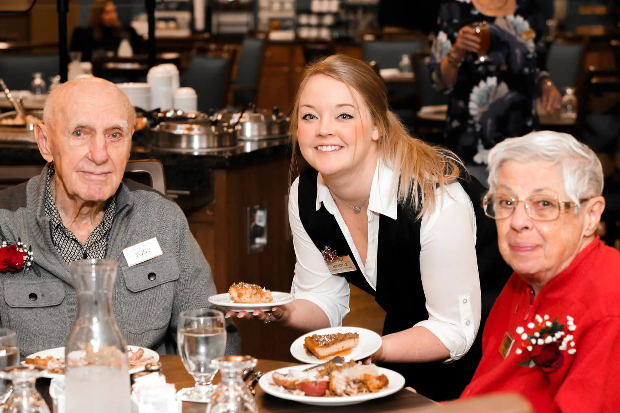 RLC waitress serving RLC residents
