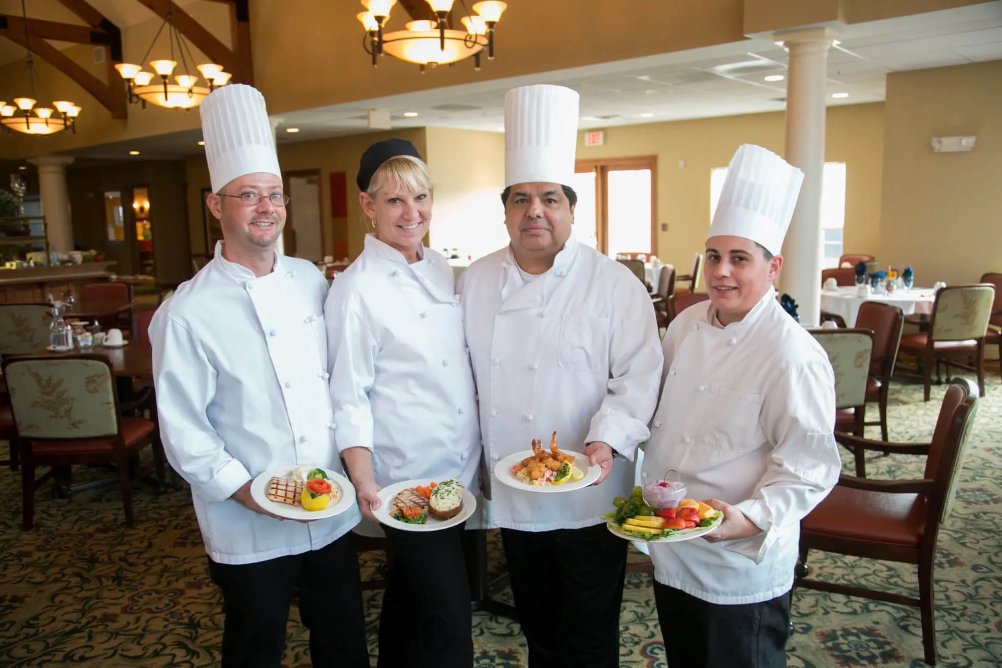RLC chefs displaying meals